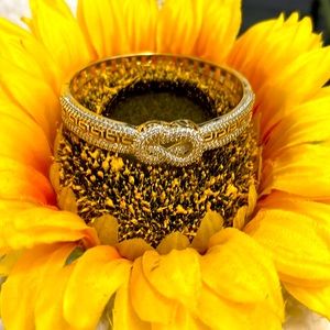 Infinity logo gold bracelet